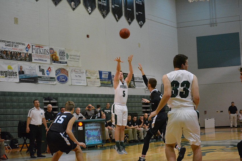 Sam Hester hits a three-pointer.