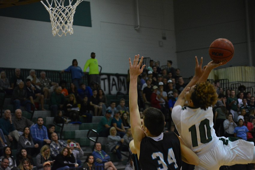 Damien Gordon gets fouled on a layup.