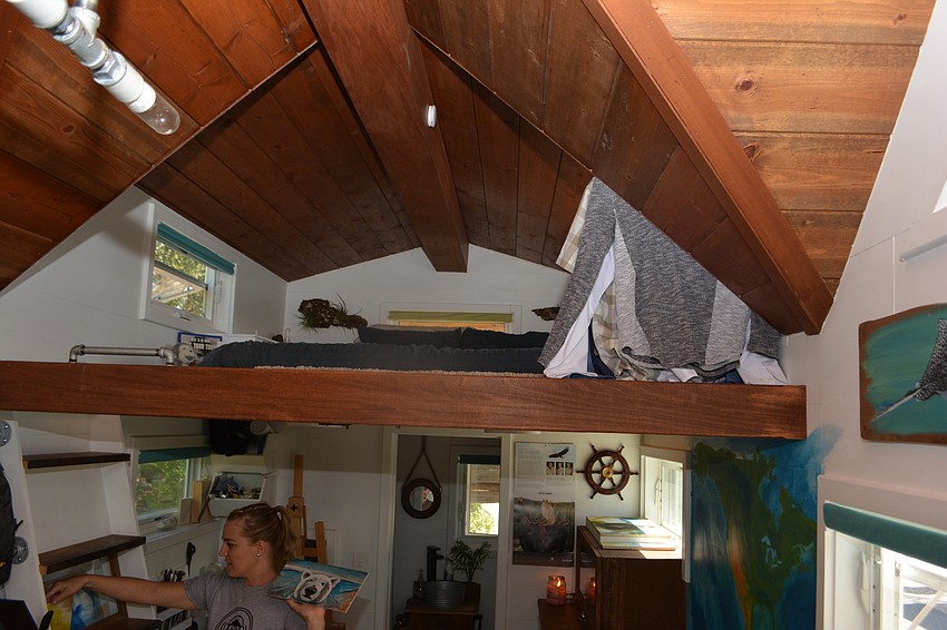 One of the perks of the Tiny House is that there is more room under the bed.