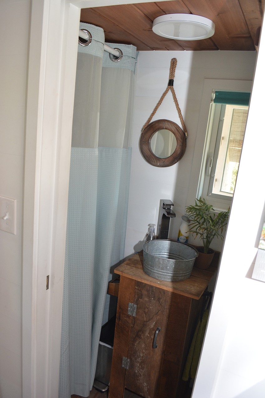 Shower time means squeezing around a corner.