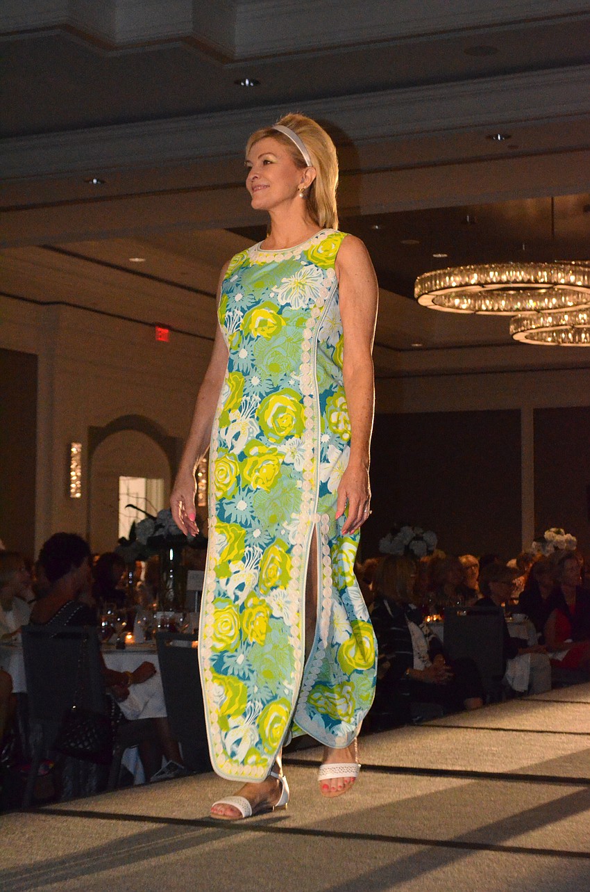 Diane Muir hits the runway in a vintage Lilly Pulitzer dress during the fashion show at The Ritz-Carlton, Sarasota on Feb. 16.