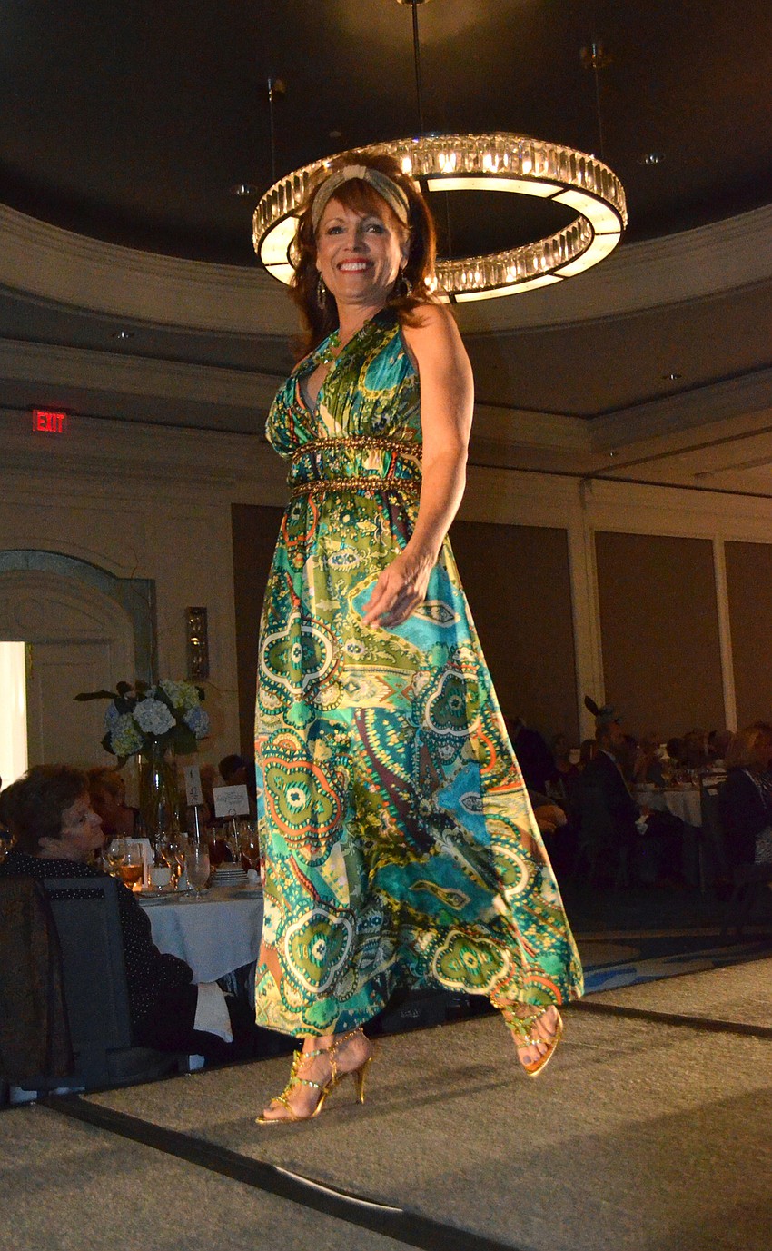 Melba Jimenez walks the runway during the fashion show at The Ritz-Carlton, Sarasota on Feb. 16.