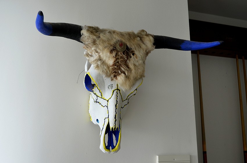 To the left of Howard Rooks’ home front entrance is a billiards room complete with decor including this bull head.