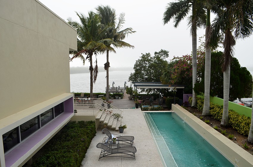 Rooks has a lap pool off of his billiards room that is attached to a large patio area complete with seating and a dock.