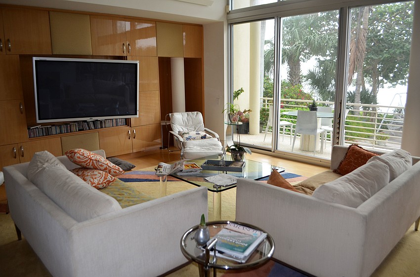 Off of the kitchen, a living room looks out into Rooks’ backyard.