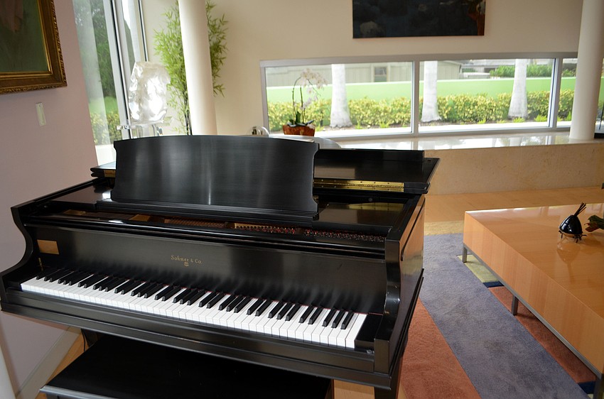 A piano completes Rooks’ spacious living room.