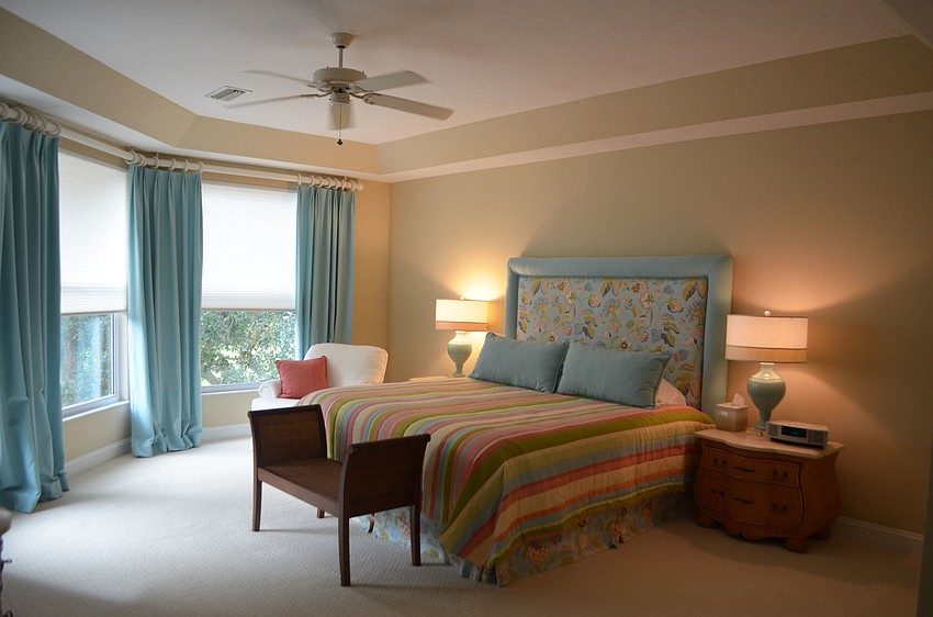 A guest bedrooms upstairs is complete with its own bathroom.