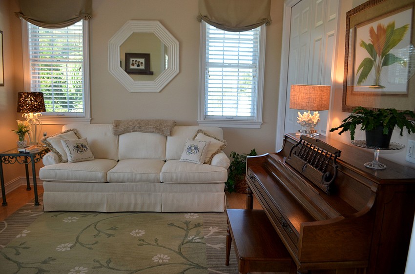 A small den off of the kitchen area can be used as a guest bedroom.