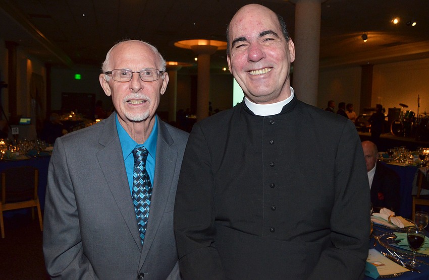 Gregg Warren and Father Robert Tatman