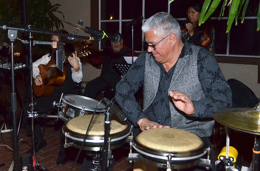 Jairo Hernandez performs with his band, Tierra Nueva, during cocktail hour.