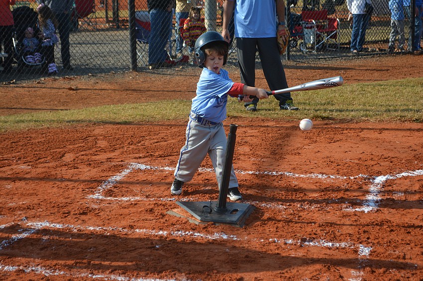 Andrew Lazaris of the Royals closes his eyes and lets it rip.
