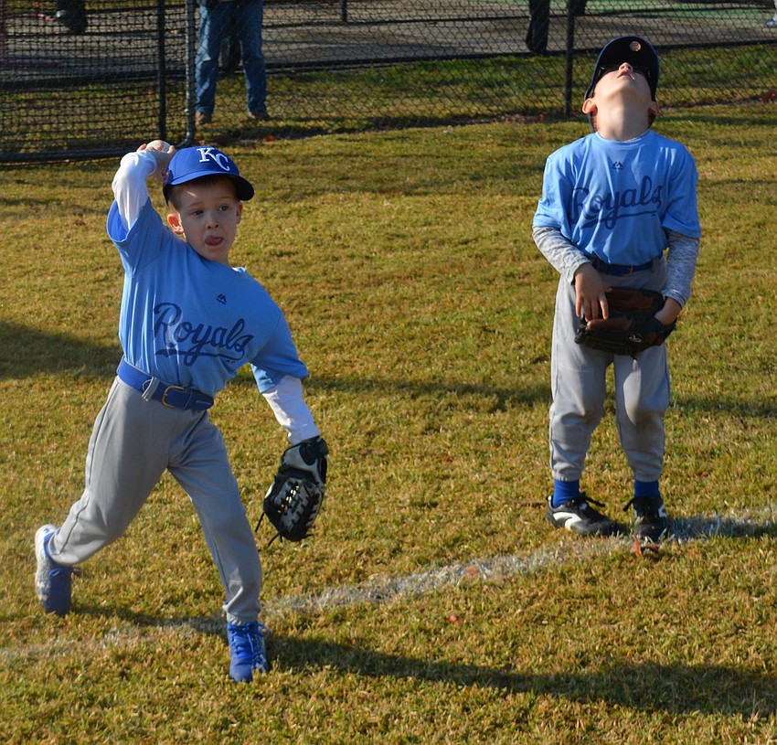 Levi Clough of the Royals steps into a practice toss.