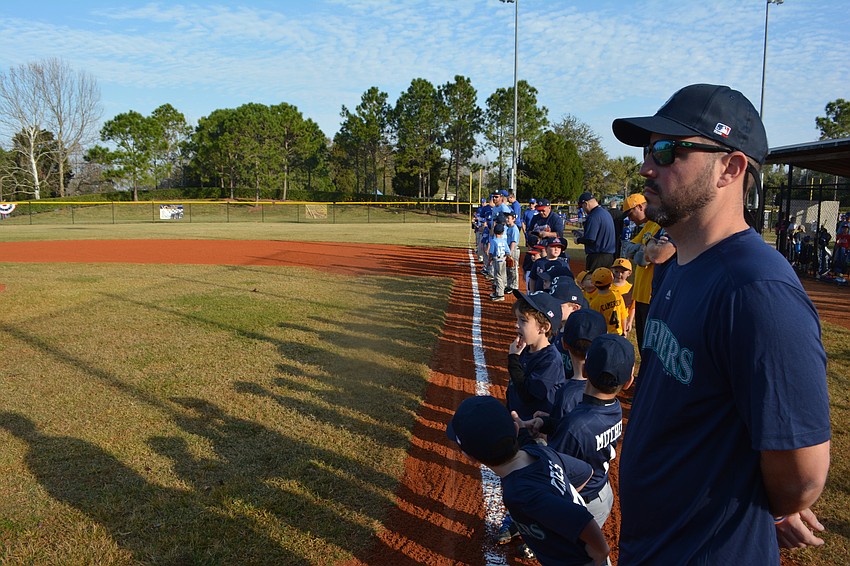 The teams lined up for the National Anthem.