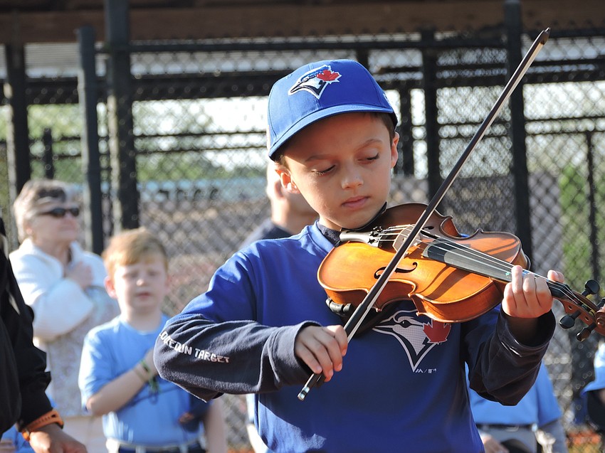 The Blue Jays'    Brody Rose, also a member of the Sarasota Youth Orchestra, plays the Star Spangled Banner.