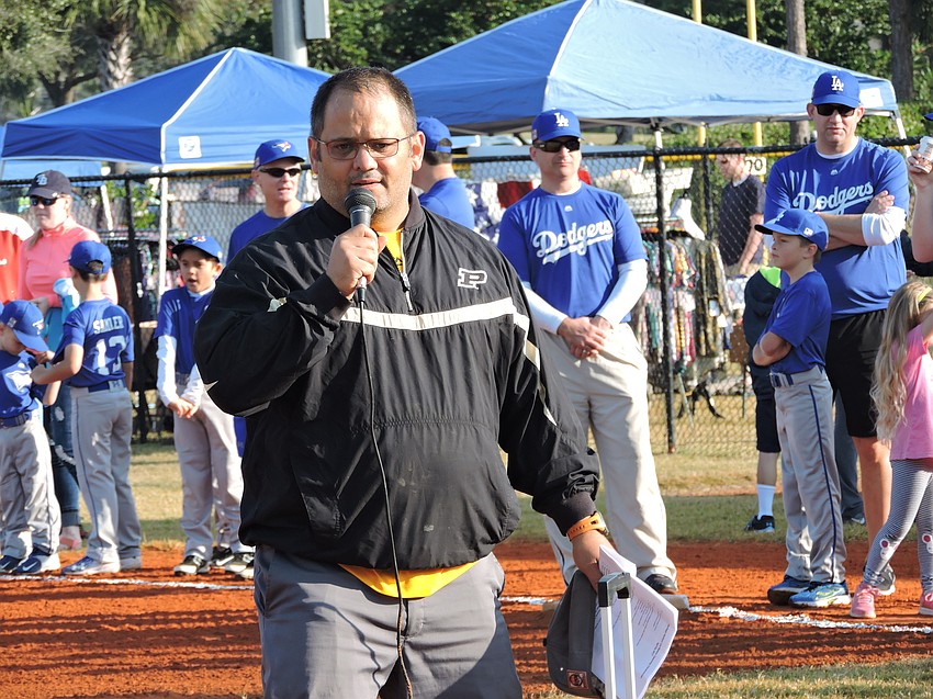 League President Steve Marrero welcomes the crowd to opening day.