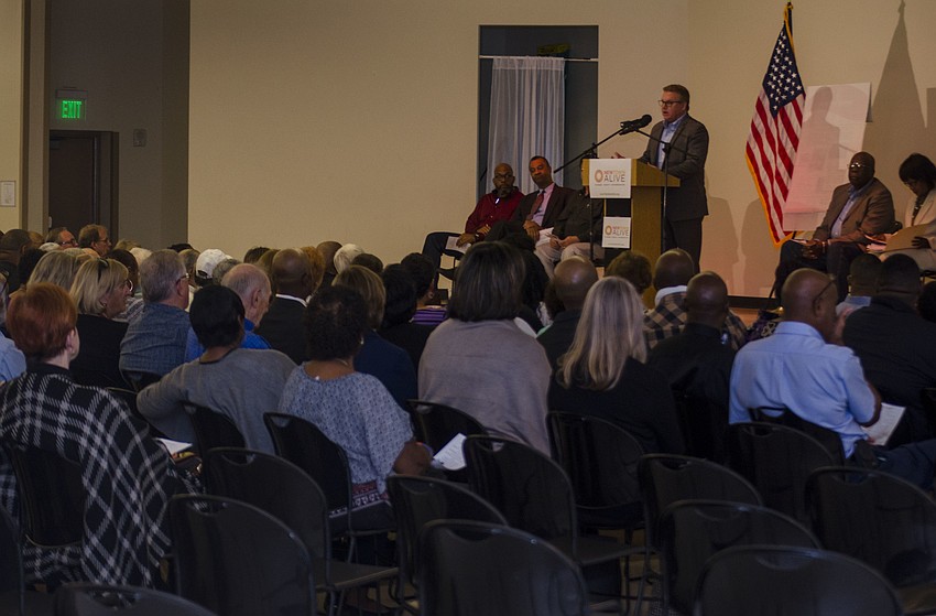 Mike Moran addresses community members.
