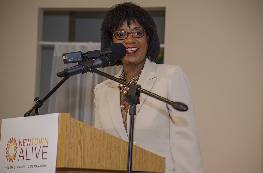 Vickie Oldham thanks community members and elected officials before the unveiling of the Newtown history markers.