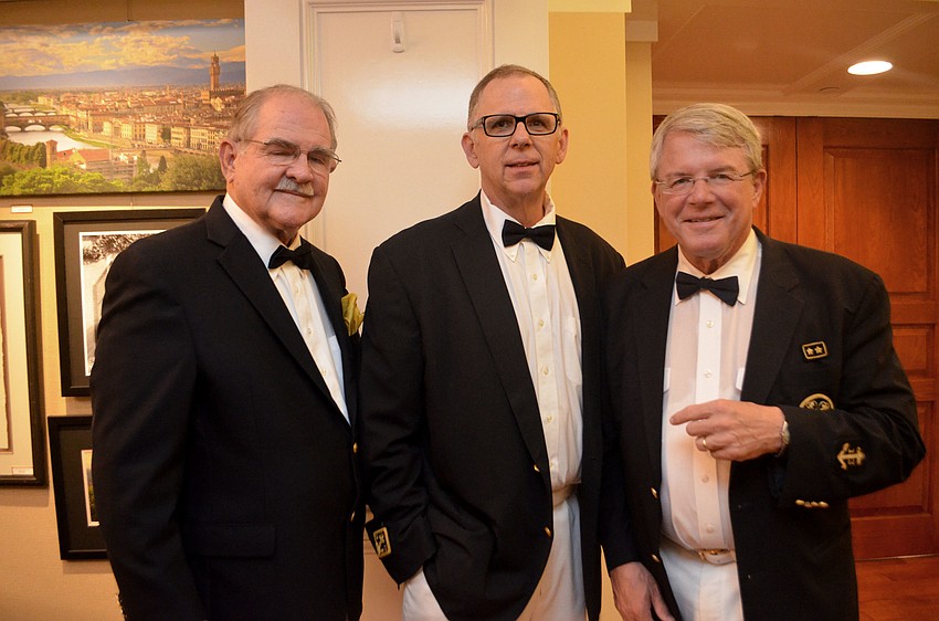 Incoming Rear Commodore Curtiss Schantz, Vice Commodore Bob Williams and Commodore Charlie Wilson