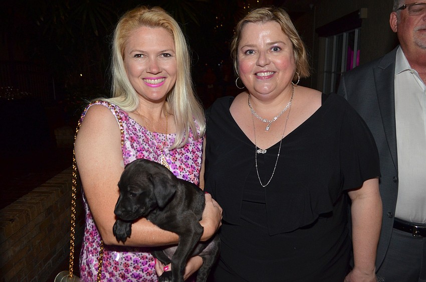 Karen Neilinger and Nancy Wagner with Carla of Nate’s Honor Animal Rescue