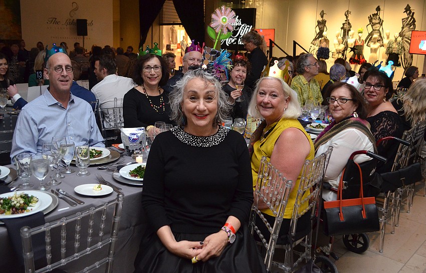 Designer Andrea made her friends and family who came to support her special hats that included materials from her runway outfit.