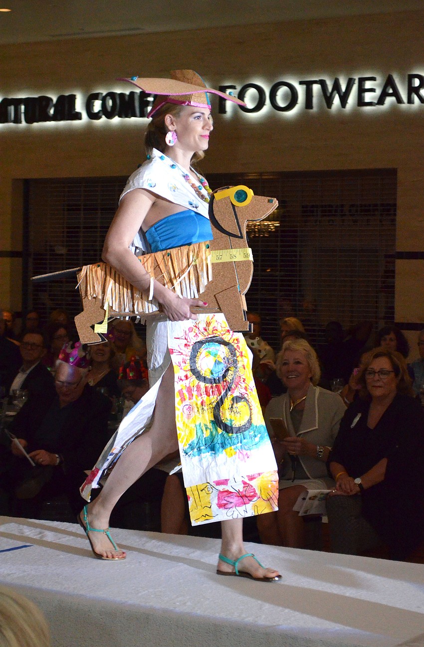 Liz Dobbins models Jim Stewart’s “Creative Builder’s Best Friend.”