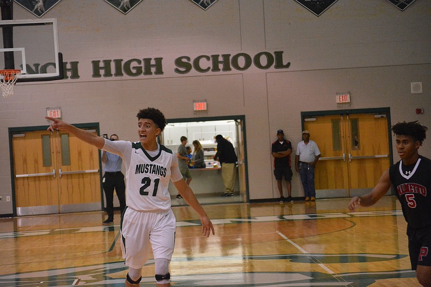 Evan Spiller calls out defensive assignments.