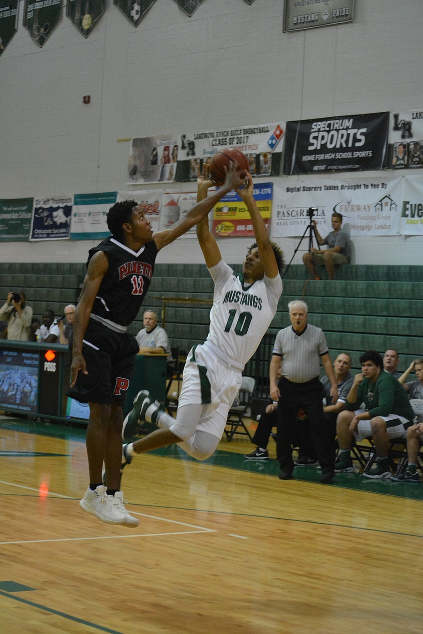 Devin Gordon gets hit by a Palmetto defender.