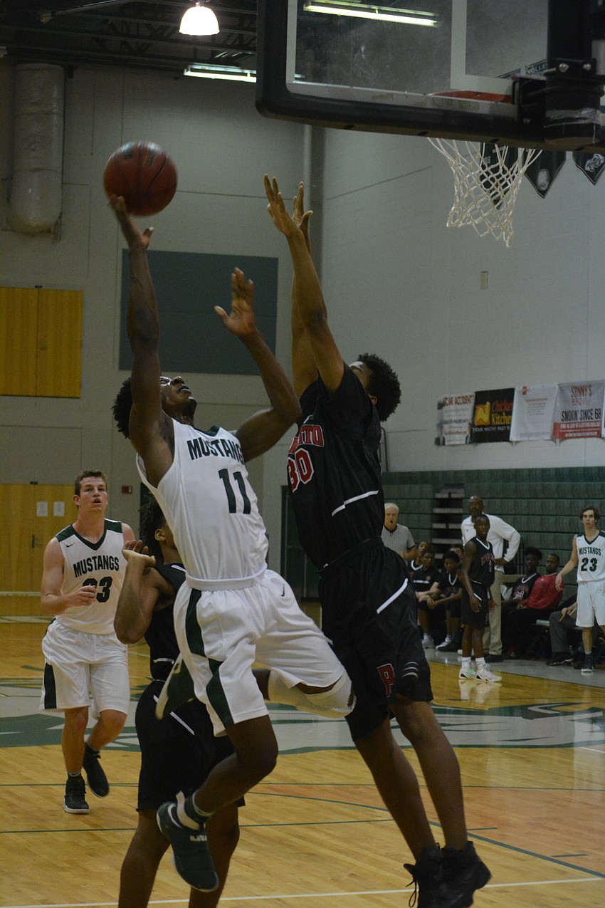 Blauvelt Georges adjust in midair for a shot.