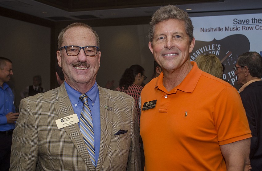 Steve Querio and The Greater Sarasota Chamber of Commerce Chairman of the Board George McGonagill.