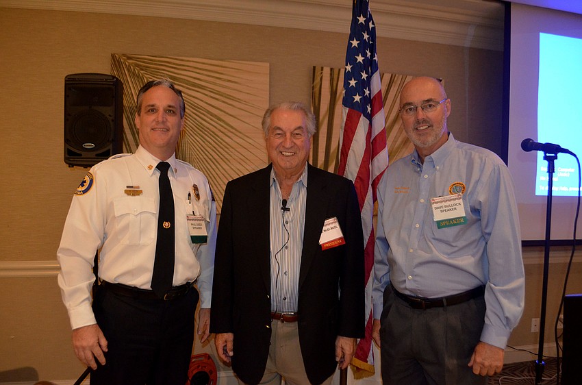 Longboat Key Fire Chief Paul Dezzi, Republican Club of Longboat Key President Joe McElmeel and Longboat Key Town Manager Dave Bullock