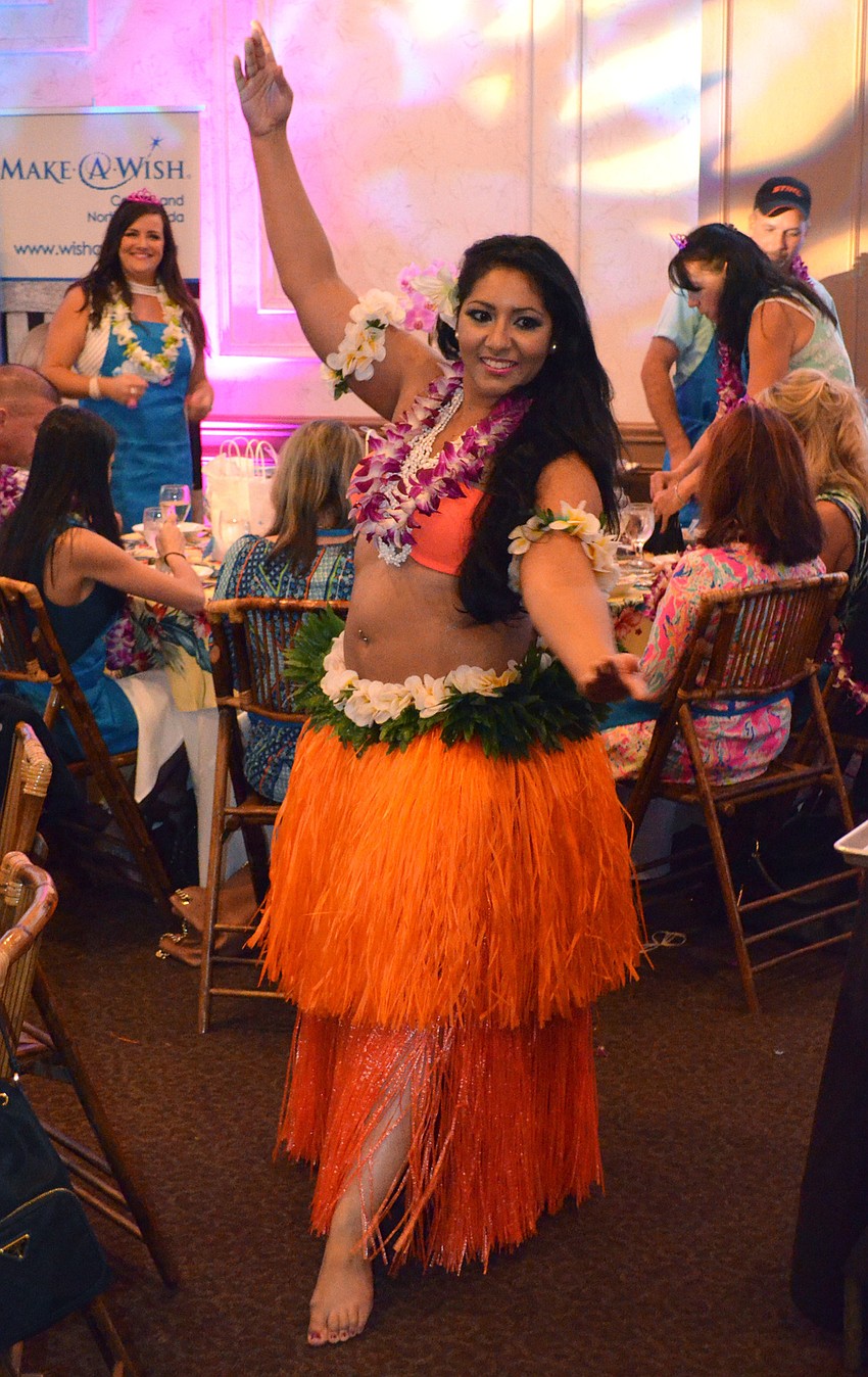 Laila Gonzalez performs a hula dance.