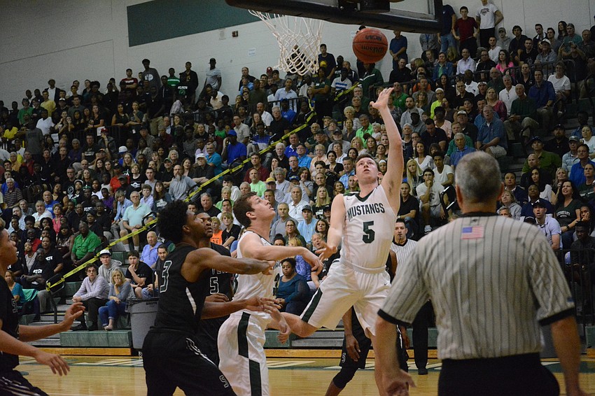 Sam Hester gets an early layup.