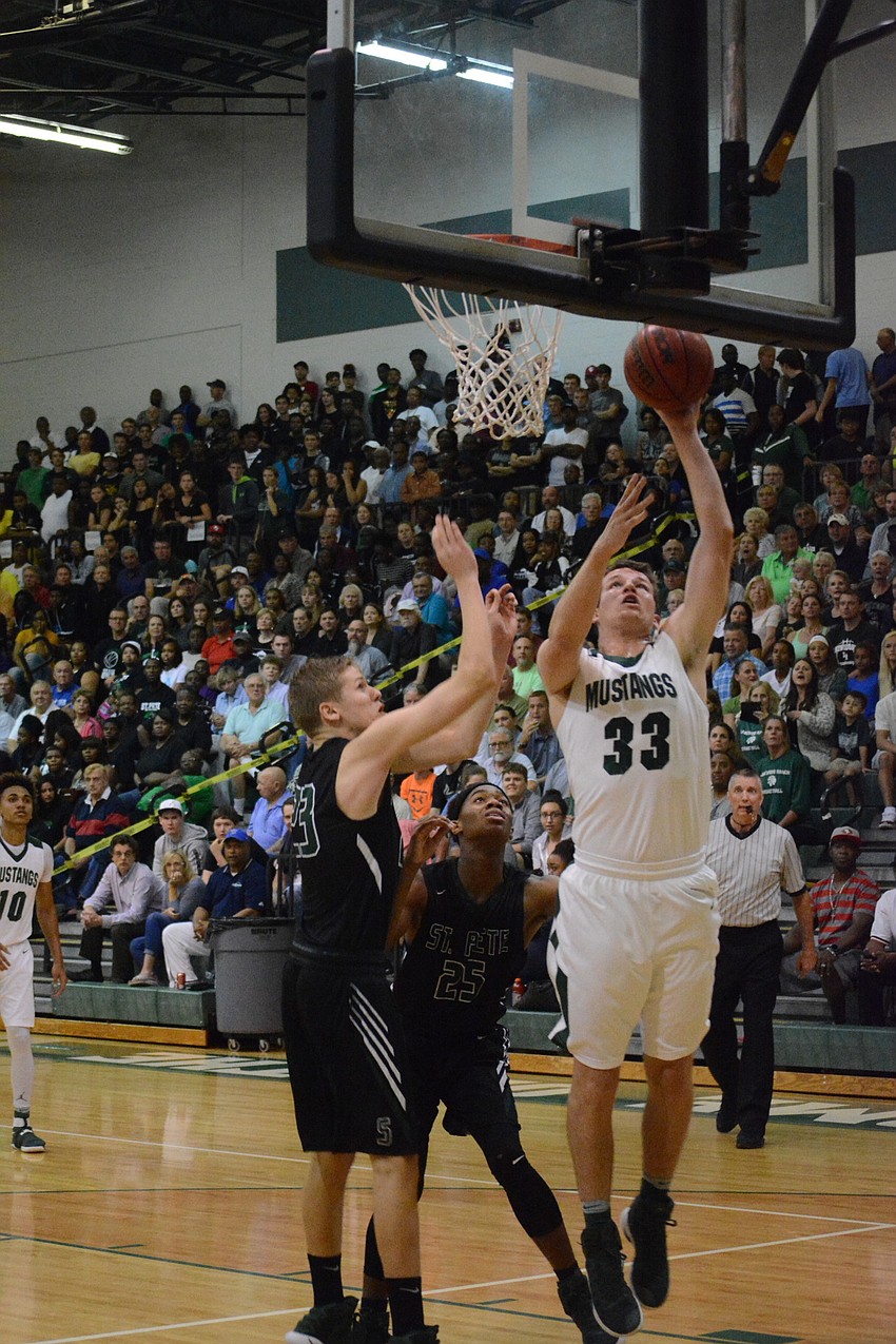 Justin Muscara gets an inside bucket.