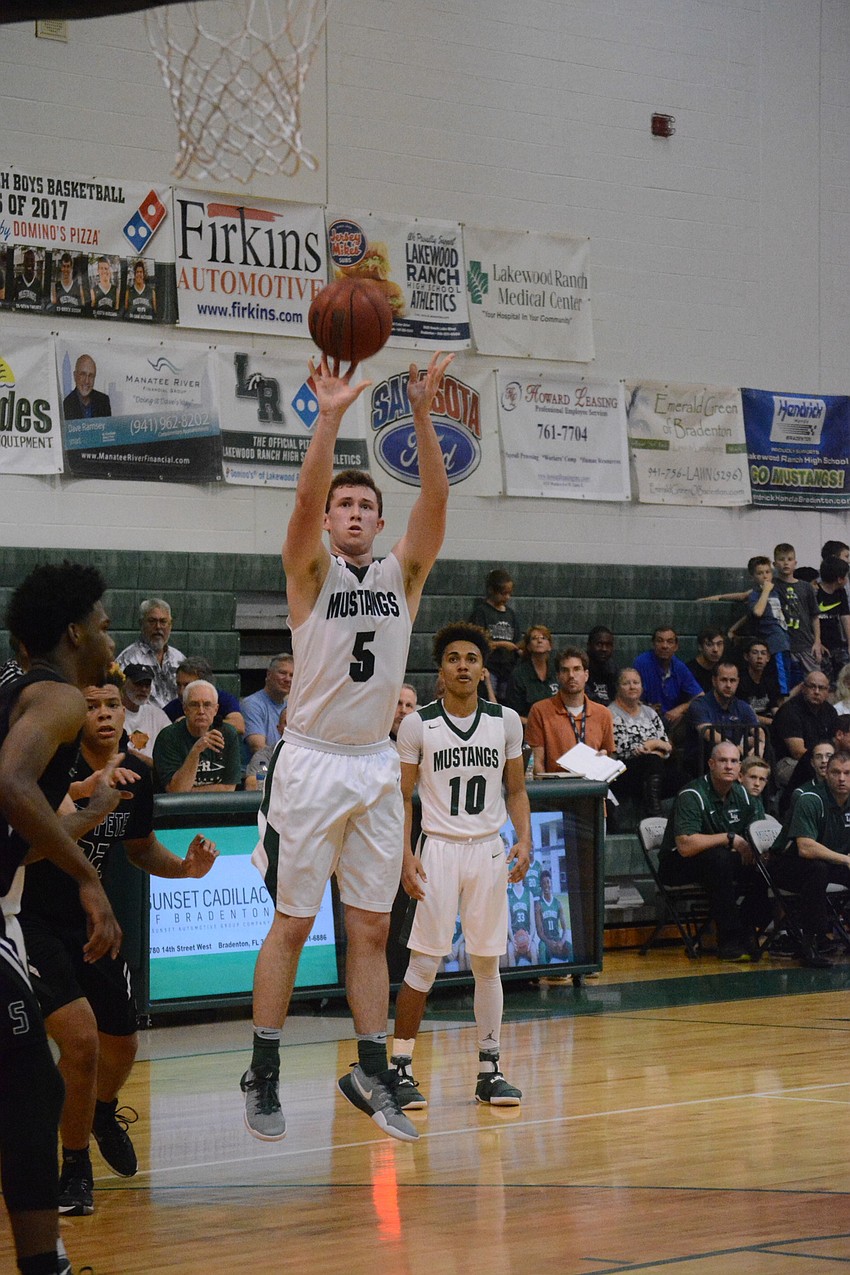 Sam Hester lets loose a mid-range jumper.