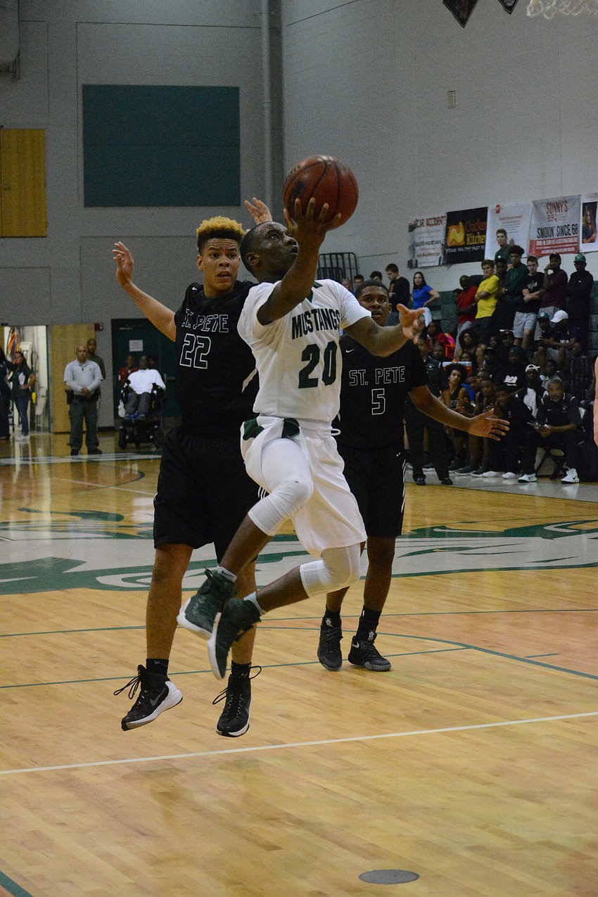 Devin Twenty goes coast-to-coast for a basket.