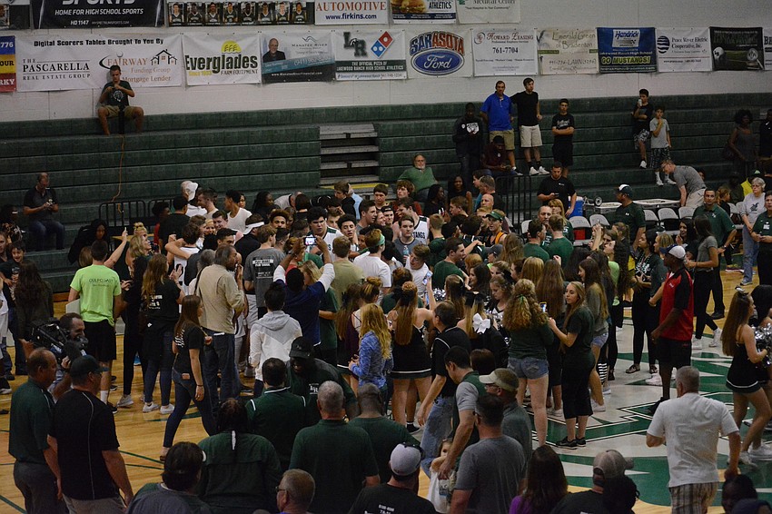 The crowd at Lakewood Ranch High School rushed the floor after the game.
