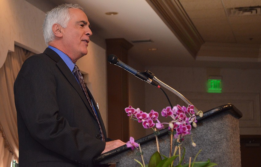 Literacy Council of Sarasota Board President Ed Carthew welcomes the crowd.