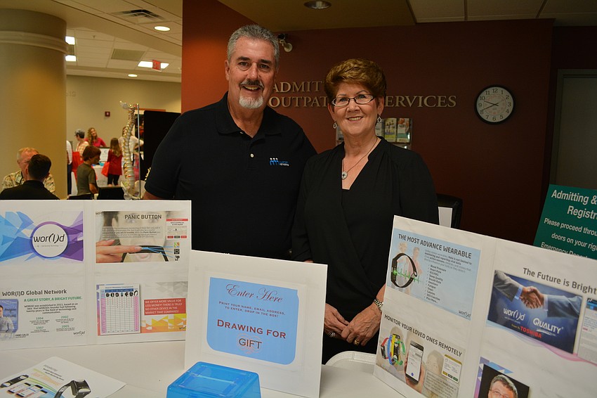 Tom Blakeley and Judy Hettinger promote HELO, a wearable technology that tracks your heart rate and other vitals.