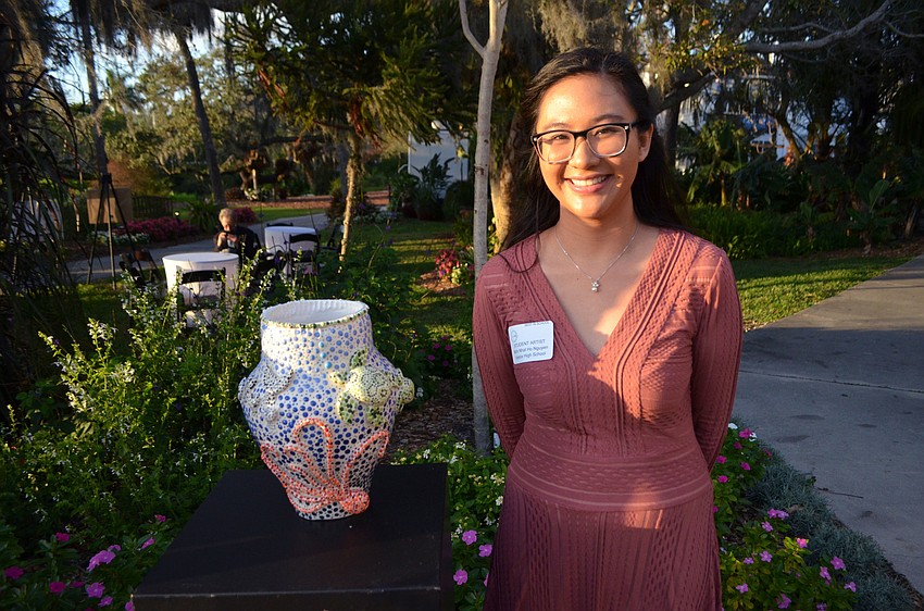 Minh Nhat Ho Nguyen with her piece, “Deep Sea of Life”