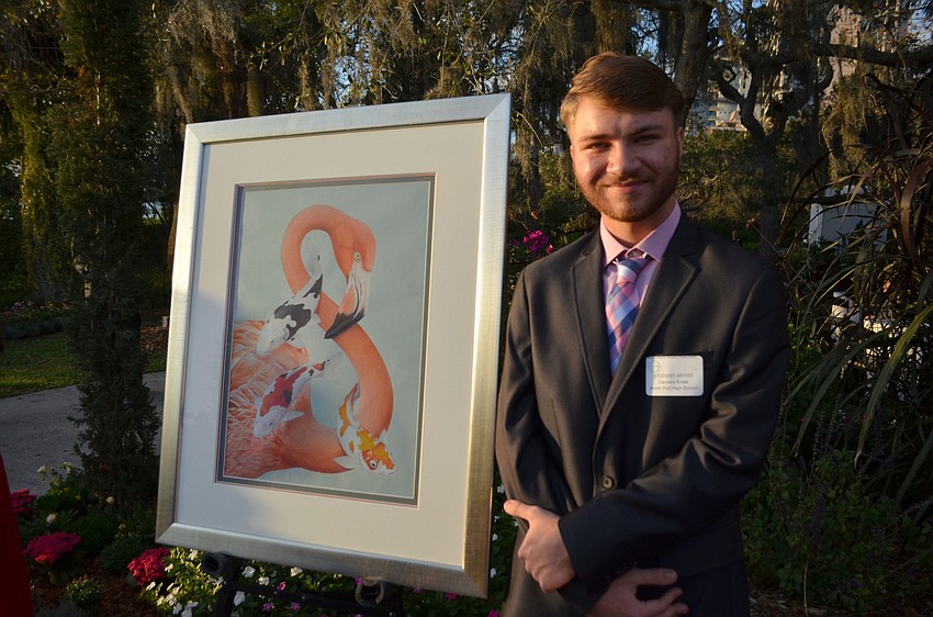Zachary Kralik with his piece, “Kozui”