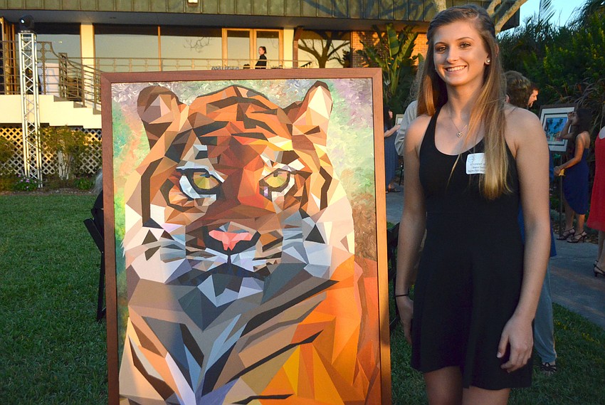 Blaire Bennice with her piece, “Systematic Tiger”