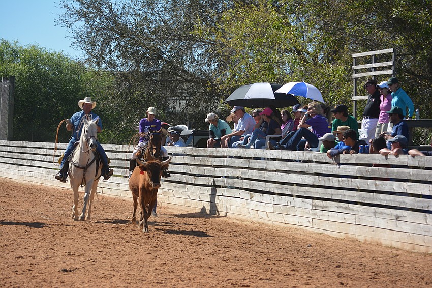 While the competitors were out in the hot sun on Saturday, many of the spectators brought umbrellas.
