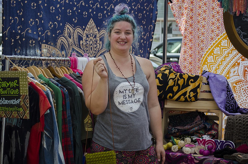 Owner of Knot + Loop Tiffanie Page poses in her booth.