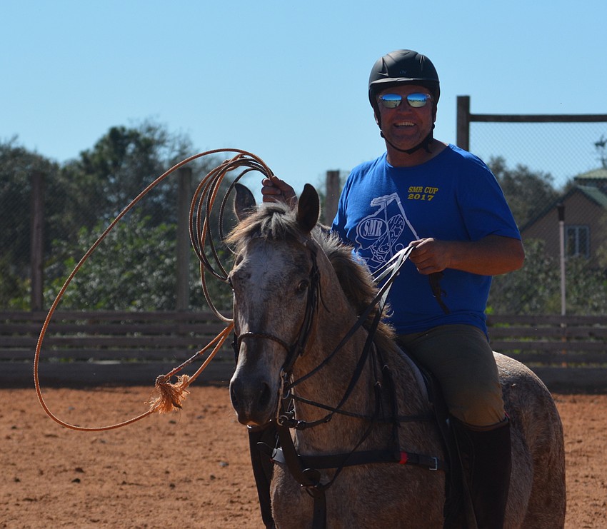 David Manuel, who does the announcing on polo Sundays, got into the act with the polo players.