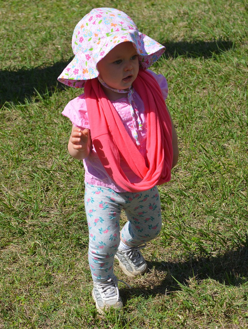 Gwendolyn John, 1, was harder to round up than the steers.