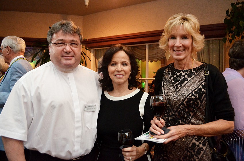 The Rev. Wojciech Stachura, Lorraine Cersosimo and Karen Brady
