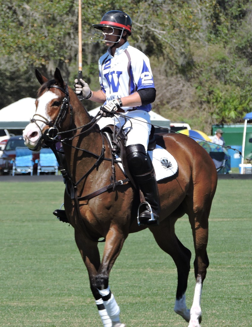 Tito'  s Buck Schott looks for a shot in the Observer Cup.