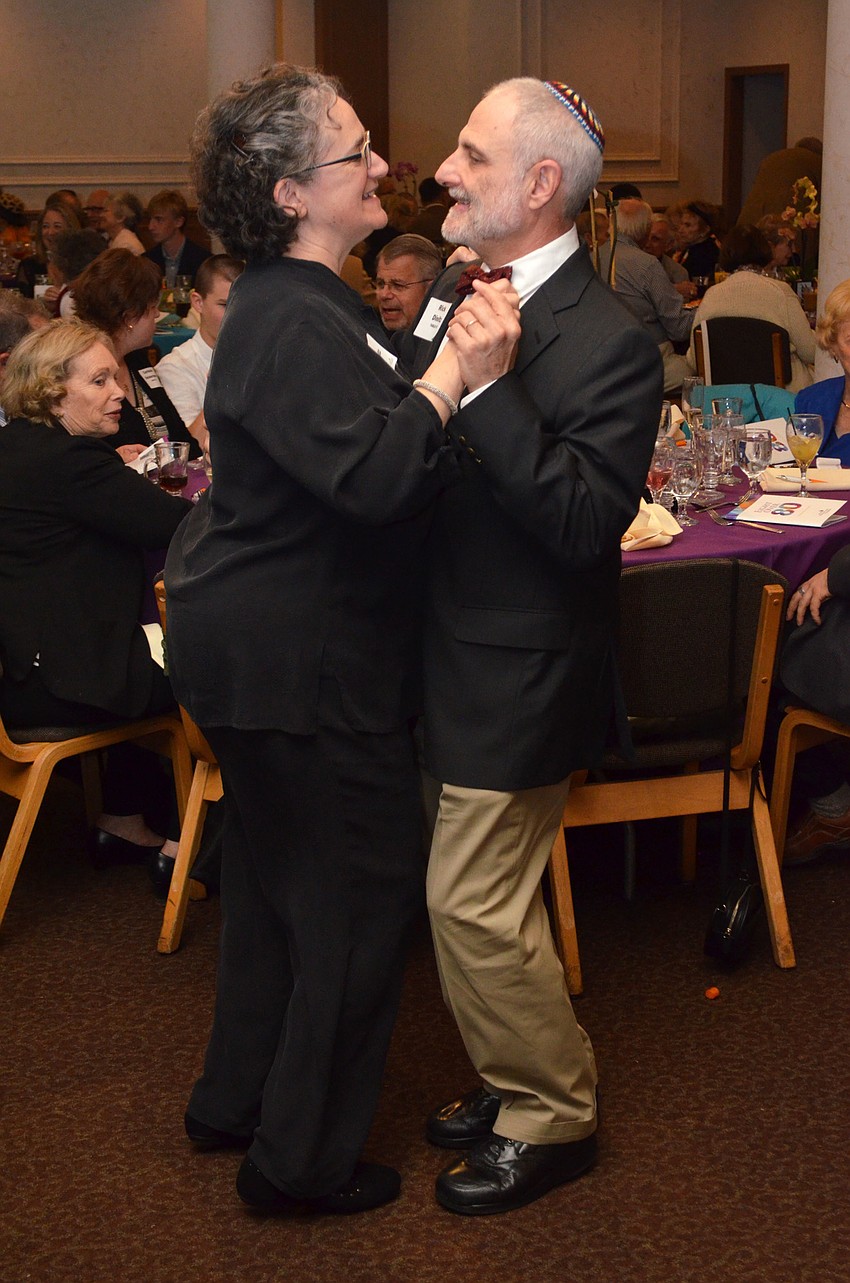 Tina Fein Dinitz dances with Rick Dinitz on Feb. 26 at Michael’s On East.