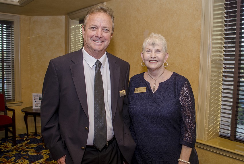 John McIntyre and Sarasota School Board Chairwoman Caroline Zucker