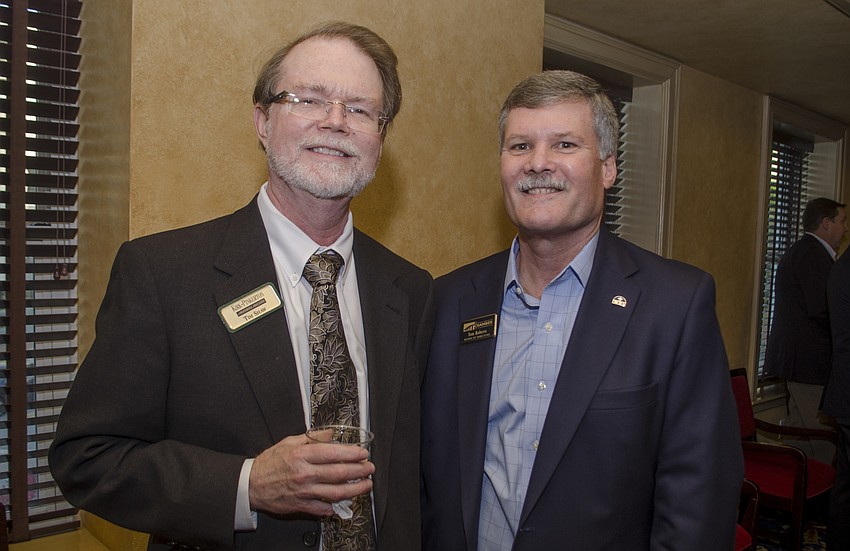 Tim Shaw and Greater Sarasota Chamber of Commerce board member Tom Roberts